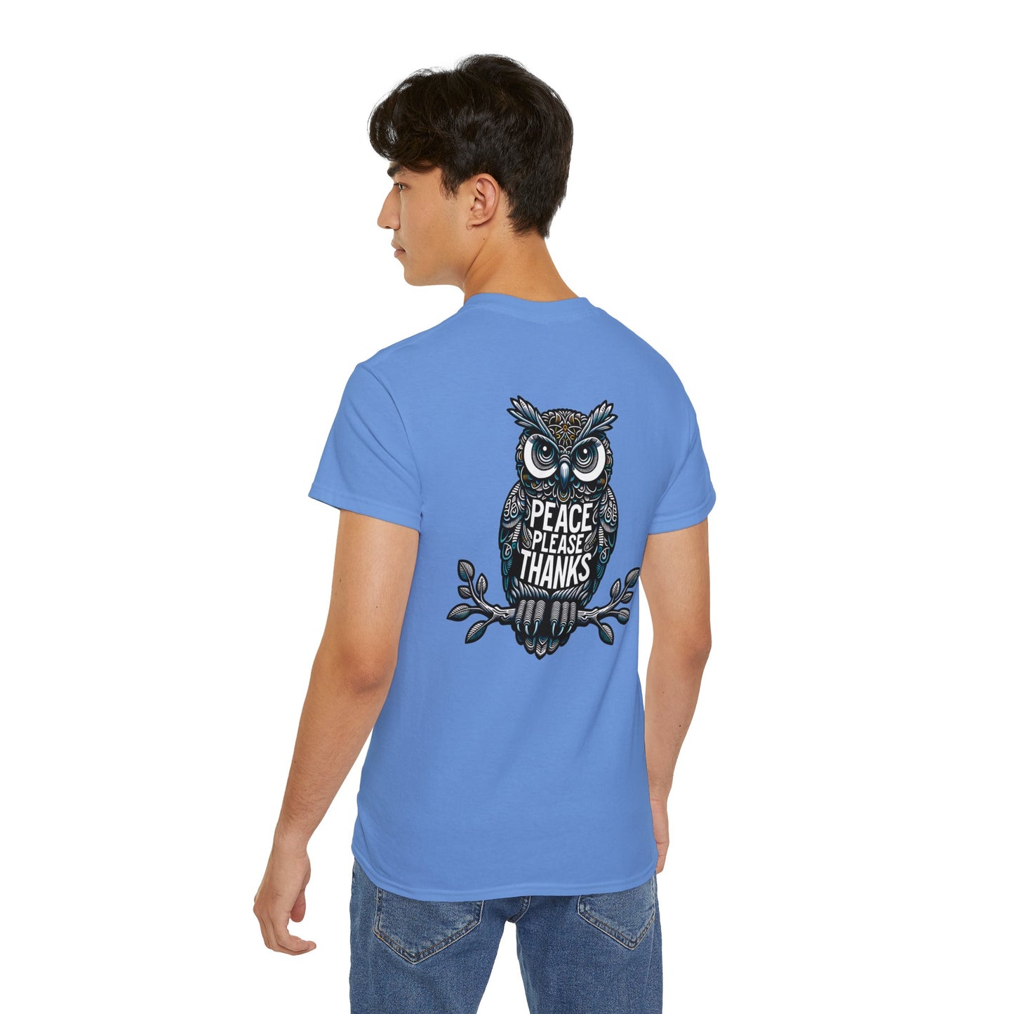 male model with carolina blue Unisex T-shirt Reflective owl illustration with 'Peace Please Thanks' message, showcasing intricate linework and subtle color highlights