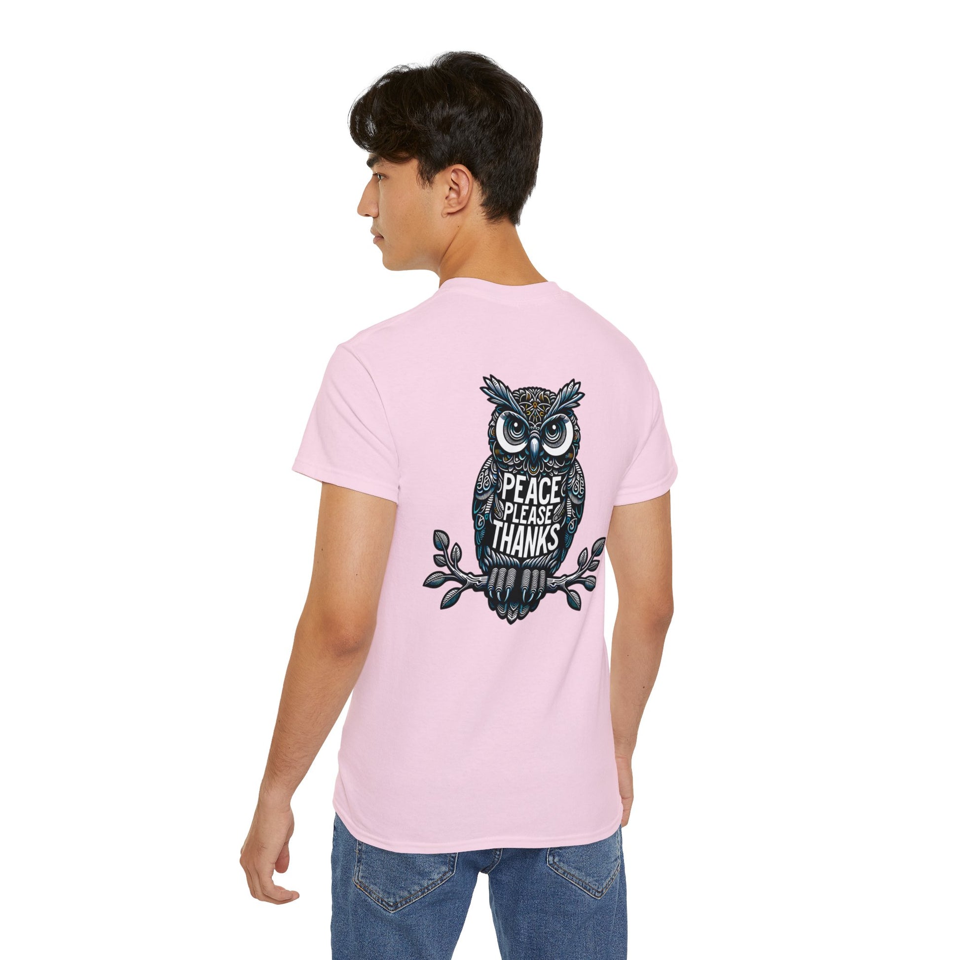 male model with light pink Unisex T-shirt:Reflective owl illustration with 'Peace Please Thanks' message, showcasing intricate linework and subtle color highlights